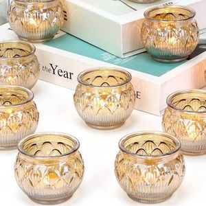 12 tea light candle holders. Used only once at my wedding. Includes LED lights